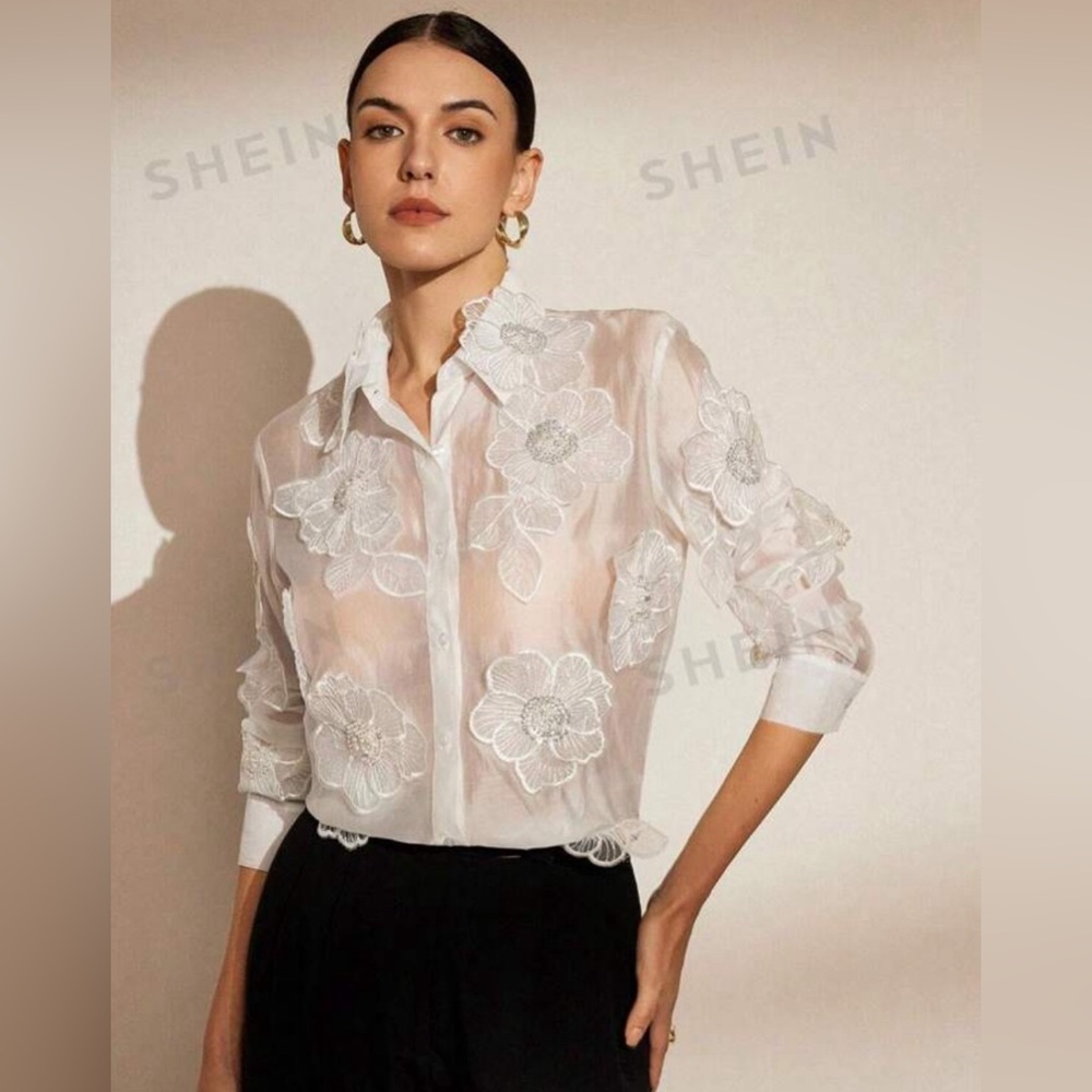 Never worn blouse embroidered